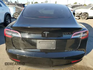 2021 Tesla Model 3 Standard Range Plus with VIN 5YJ3E1EA5MF082272, listed as a Copart auction lot 88724475 with 22,613 mi miles and Salvage Title. Bid and sale history available at carsss.com. Image 6.