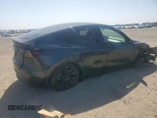 2024 Tesla Model Y с VIN 7SAYGDED2RF100152, выставлен на аукционе Copart как лот 52133535 с пробегом 7 632 миль миль и Списание • Salvage title. История ставок и продаж доступна на DreamBid. Изображение 3.