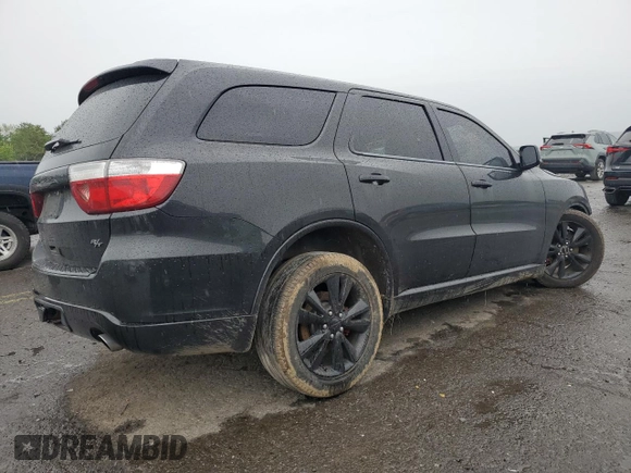 2012 Dodge Durango R/T with VIN 1C4SDJCT2CC104470, listed as a Copart auction lot 58360745 with 134,361 mi miles and Salvage title. Bid and sale history available at DreamBid. Image 3.