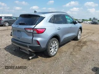2022 Ford Escape Titanium with VIN 1FMCU9J94NUB57495, listed as a IAAI auction lot 42530044 with 27,075 mi miles and . Bid and sale history available at DreamBid. Image 4.