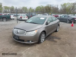 2011 Buick LaCrosse CXS with VIN 1G4GE5ED7BF264272, listed as a IAAI auction lot 42044031 with 151,661 mi miles. Bid and sale history available at carsss.com. Image 2.