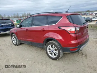 2018 Ford Escape SE z VIN 1FMCU9GD1JUC72707, wystawiony jako Copart lot #47829264 z przebiegiem 96 341 mil mil oraz Szkoda całkowita • Salvage title. Historia ofert i sprzedaży dostępna na DreamBid. Obrazek 2.