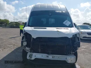 2018 Ford Transit with VIN 1FTYR2XM6JKA01981, listed as a IAAI auction lot 41898930 with 128,326 mi miles and . Bid and sale history available at DreamBid. Image 6.