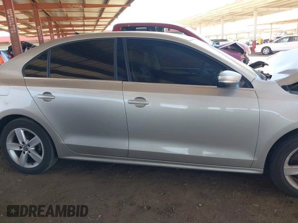 2014 Volkswagen Jetta TDI w/Premium with VIN 3VWLL7AJ1EM228062, listed as a IAAI auction lot 42256650 with 218,955 mi miles and . Bid and sale history available at DreamBid. Image 13.