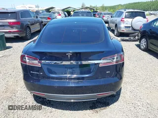 2014 Tesla Model S 60 with VIN 5YJSA1H18EFP31969, listed as a IAAI auction lot 42312485 with 90,043 mi miles and . Bid and sale history available at DreamBid. Image 17.