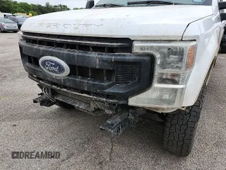 2022 Ford F-250 XL z VIN 1FT7W2B66NEE94143, wystawiony jako IAAI lot #42239265 z przebiegiem 141 562 mil mil oraz . Historia ofert i sprzedaży dostępna na DreamBid. Obrazek 1.