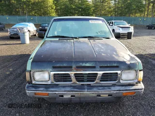 1989 Nissan Hardbody z VIN 1N6ND16S1KC396897, wystawiony jako Copart lot #85928624 z przebiegiem 148 866 mil mil oraz Szkody całkowita. Historia ofert i sprzedaży dostępna na DreamBid. Obrazek 5.
