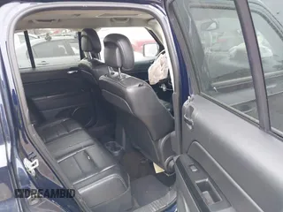 2014 Jeep Patriot Latitude with VIN 1C4NJPFA4ED681811, listed as a IAAI auction lot 41069070 with 143,467 mi miles and . Bid and sale history available at carsss.com. Image 8.
