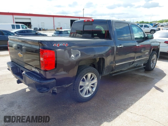 2014 Chevrolet Silverado 1500 High Country with VIN 3GCUKTEC8EG399193, listed as a IAAI auction lot 41789709 with 207,890 mi miles. Bid and sale history available at carsss.com. Image 4.