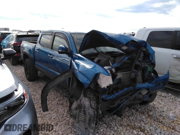 2016 Toyota Tacoma SR with VIN 5TFCZ5AN0GX045905, listed as a Copart auction lot 51798555 with 104,292 mi miles and Salvage Title. Bid and sale history available at DreamBid. Image 4.