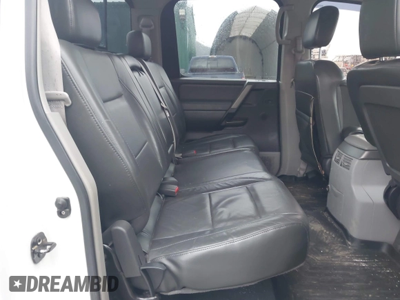 2004 Nissan Titan LE with VIN 1N6AA07B24N579345, listed as a IAAI auction lot 42174006 with 142,780 mi miles and . Bid and sale history available at DreamBid. Image 8.