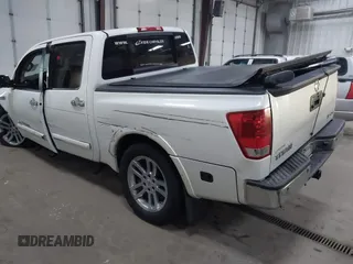 2014 Nissan Titan S with VIN 1N6AA0EC1EN504617, listed as a IAAI auction lot 41633861 with 65,047 mi miles. Bid and sale history available at carsss.com. Image 3.