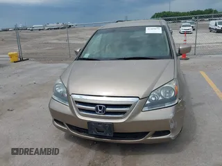 2005 Honda Odyssey EX with VIN 5FNRL38475B029026, listed as a IAAI auction lot 42489079 with 156,075 mi miles and . Bid and sale history available at DreamBid. Image 6.