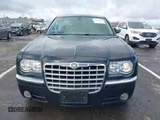 2006 Chrysler 300 C with VIN 2C3LK63H66H142437, listed as a IAAI auction lot 41751890 with 57,374 mi miles. Bid and sale history available at carsss.com. Image 12.