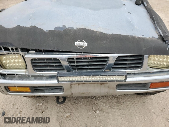 1995 Nissan Frontier XE with VIN 1N6SD11Y2SC308065, listed as a Copart auction lot 45282595 with 51,994 mi miles and Salvage title. Bid and sale history available at DreamBid. Image 12.