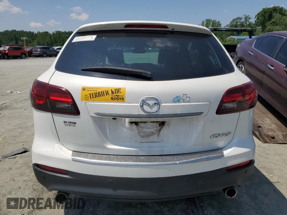 2015 Mazda CX-9 Grand Touring z VIN JM3TB2DA3F0452160, wystawiony jako Copart lot #60220655 z przebiegiem 145 185 mil mil oraz Szkoda całkowita • Salvage title. Historia ofert i sprzedaży dostępna na DreamBid. Obrazek 6.