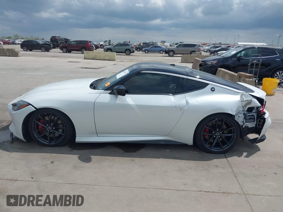 2024 Nissan Z Performance with VIN JN1BZ4BH1RM361447, listed as a IAAI auction lot 41903275 with 9,574 mi miles and . Bid and sale history available at DreamBid. Image 14.