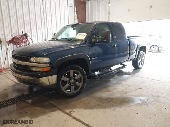 1999 Chevrolet Silverado 1500 LS with VIN 2GCEC19W4X1234733, listed as a IAAI auction lot 41893288 with 158,825 mi miles. Bid and sale history available at carsss.com. Image 2.