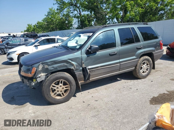 2002 Jeep Grand Cherokee Laredo with VIN 1J4GW48S02C174656, listed as a Copart auction lot 56954155 with 235,427 mi miles and Salvage title. Bid and sale history available at DreamBid. Image 1.