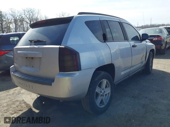 2007 Jeep Compass Sport with VIN 1J8FT47W27D414041, listed as a IAAI auction lot 41760017 with 197,437 mi miles. Bid and sale history available at carsss.com. Image 4.