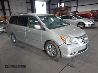 2009 Honda Odyssey Touring с VIN 5FNRL38979B005813, выставлен на аукционе IAAI как лот 41049383 с пробегом 174 897 миль миль и . История ставок и продаж доступна на DreamBid. Изображение 1.