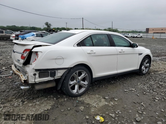 2012 Ford Taurus SHO with VIN 1FAHP2KT2CG141879, listed as a Copart auction lot 56558365 with 105,230 mi miles and Salvage title. Bid and sale history available at DreamBid. Image 3.