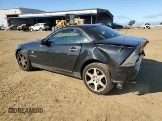 2000 Mercedes-Benz SLK 230 Kompressor with VIN WDBKK47F1YF164000, listed as a Copart auction lot 46366685 with 127,904 mi miles and Salvage title. Bid and sale history available at DreamBid. Image 2.