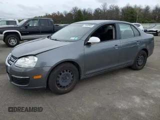 2009 Volkswagen Jetta S z VIN 3VWJZ71K59M176410, wystawiony jako Copart lot #71442444 z przebiegiem 96 298 mil mil oraz Szkoda całkowita • Salvage title. Historia ofert i sprzedaży dostępna na DreamBid. Obrazek 1.
