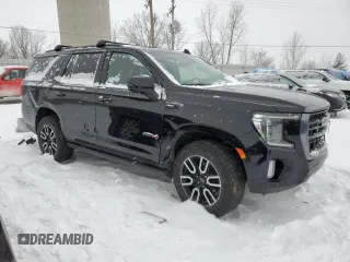 2023 GMC Yukon AT4 with VIN 1GKS2CKD4PR163281, listed as a Copart auction lot 44990525 with 54,966 mi miles and Salvage Title. Bid and sale history available at carsss.com. Image 4.