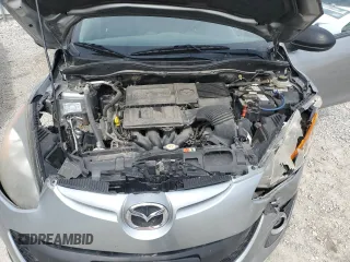 2014 Mazda 2 Touring z VIN JM1DE1LY5E0176964, wystawiony jako Copart lot #48875405 z przebiegiem 128 264 mil mil oraz Szkoda całkowita • Salvage title. Historia ofert i sprzedaży dostępna na DreamBid. Obrazek 11.