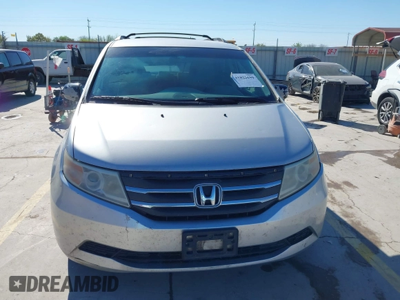 2012 Honda Odyssey EX with VIN 5FNRL5H48CB131881, listed as a IAAI auction lot 41822159 with 354,718 mi miles and . Bid and sale history available at DreamBid. Image 12.