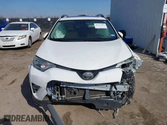 2018 Toyota RAV4 XLE with VIN JTMWFREV7JJ728184, listed as a IAAI auction lot 41377413 with 117,957 mi miles. Bid and sale history available at carsss.com. Image 11.