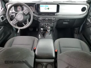 2024 Jeep Wrangler Sport S with VIN 1C4PJXDN4RW124924, listed as a Copart auction lot 50516555 with 7,747 mi miles and Salvage Title. Bid and sale history available at DreamBid. Image 8.