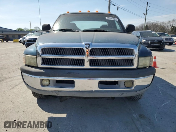 1999 Dodge 2500 with VIN 1B7KC23Z0XJ594695, listed as a Copart auction lot 50990825 with 235,365 mi miles and Clean title. Bid and sale history available at DreamBid. Image 5.