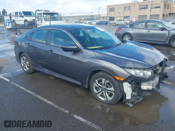 2017 Honda Civic LX z VIN 2HGFC2F50HH540361, wystawiony jako IAAI lot #41809159 z przebiegiem 96 590 mil mil oraz . Historia ofert i sprzedaży dostępna na DreamBid. Obrazek 1.