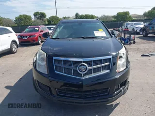 2015 Cadillac SRX with VIN 3GYFNAE33FS522380, listed as a IAAI auction lot 41641899 with 193,818 mi miles and . Bid and sale history available at DreamBid. Image 13.