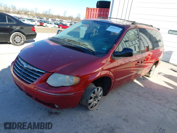 2005 Chrysler Town & Country Touring with VIN 2C8GP54L65R233842, listed as a IAAI auction lot 41682211 with 232,830 mi miles. Bid and sale history available at carsss.com. Image 2.
