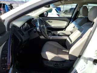 2015 Mazda CX-9 Grand Touring с VIN JM3TB2DA1F0462203, выставлен на аукционе Copart как лот 37073714 с пробегом 101 293 миль миль и Списание • Salvage title. История ставок и продаж доступна на DreamBid. Изображение 7.