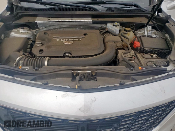2021 Cadillac XT4 FWD Premium Luxury z VIN 1GYFZCR42MF004233, wystawiony jako Copart lot #57229385 z przebiegiem 98 387 mil mil oraz Szkody całkowita. Historia ofert i sprzedaży dostępna na DreamBid. Obrazek 12.