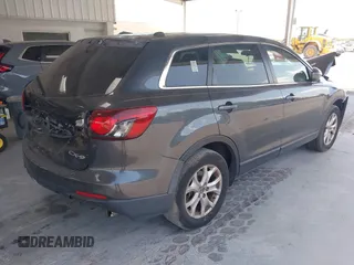 2014 Mazda CX-9 Touring with VIN JM3TB2CA9E0443012, listed as a IAAI auction lot 42159985 with 156,352 mi miles and . Bid and sale history available at DreamBid. Image 4.