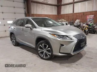 2018 Lexus RX 450hL Premium z VIN JTJDGKCA6J2004313, wystawiony jako IAAI lot #42270567 z przebiegiem 72 692 mil mil oraz . Historia ofert i sprzedaży dostępna na DreamBid. Obrazek 1.
