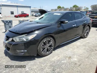 2016 Nissan Maxima SL with VIN 1N4AA6AP1GC409820, listed as a Copart auction lot 65558494 with 121,059 mi miles and Salvage title. Bid and sale history available at DreamBid. Image 1.