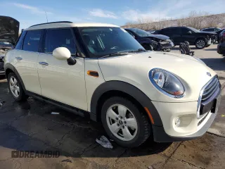2019 MINI Hardtop 4 Door Cooper with VIN WMWXU1C57K2J01914, listed as a Copart auction lot 84330304 with 43,399 mi miles and Salvage Title. Bid and sale history available at DreamBid. Image 4.
