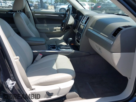 2010 Chrysler 300 Touring with VIN 2C3CA5CV7AH284713, listed as a IAAI auction lot 42221918 with 121,389 mi miles and . Bid and sale history available at DreamBid. Image 5.