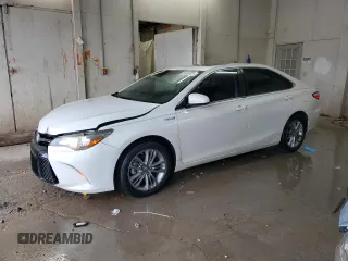 2015 Toyota Camry LE z VIN 4T1BD1FK9FU176151, wystawiony jako Copart lot #56653005 z przebiegiem 207 364 mil mil oraz Szkody całkowita. Historia ofert i sprzedaży dostępna na DreamBid. Obrazek 1.