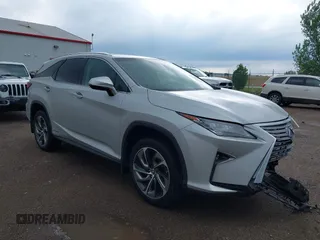 2018 Lexus RX 450hL Premium with VIN JTJDGKCA6J2003954, listed as a IAAI auction lot 42259774 with 93,706 mi miles and . Bid and sale history available at DreamBid. Image 1.
