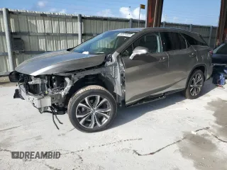 2020 Lexus RX 350L with VIN JTJHZKEA1L2015764, listed as a Copart auction lot 58324465 with 54,860 mi miles and Salvage title. Bid and sale history available at DreamBid. Image 1.
