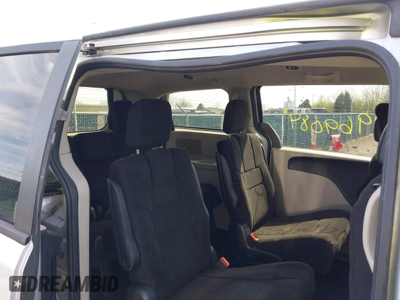 2012 Dodge Grand Caravan SE with VIN 2C4RDGBG6CR241232, listed as a IAAI auction lot 41969084 with 83,847 mi miles and . Bid and sale history available at DreamBid. Image 8.