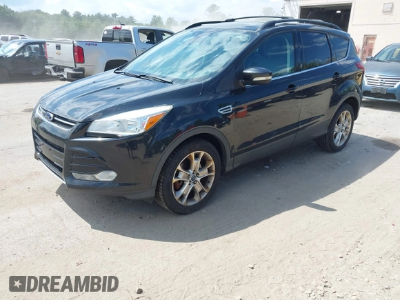 2013 Ford Escape SEL with VIN 1FMCU9HX5DUC90186, listed as a IAAI auction lot 42650691 with 151,009 mi miles and . Bid and sale history available at DreamBid. Image 2.