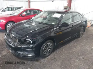2021 Volkswagen Jetta S z VIN 3VWC57BU4MM009212, wystawiony jako IAAI lot #42136463 z przebiegiem 93 627 mil mil oraz . Historia ofert i sprzedaży dostępna na DreamBid. Obrazek 2.